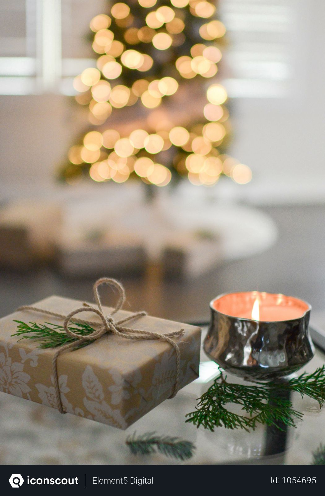 Free Close Up Photo Of Gift Along With Lit Candle Photo Download In Png Jpg Format