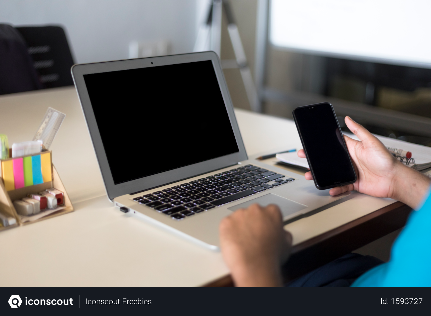 Free Person Showing Laptop And Smartphone Blank Screen At Office