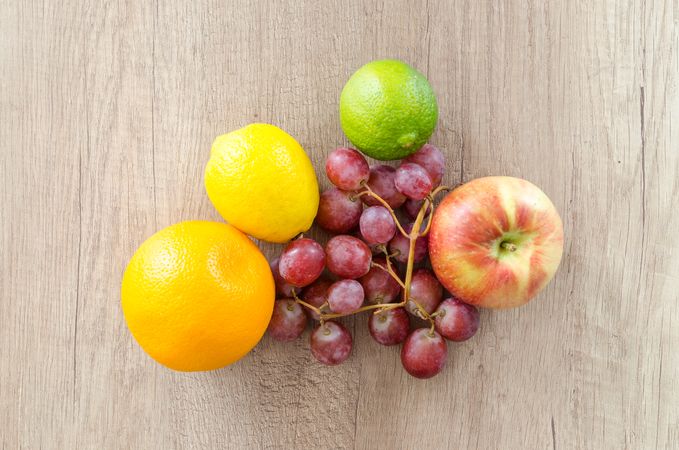 Apple, Citrus, Orange Fruits On Wooden Table Photo