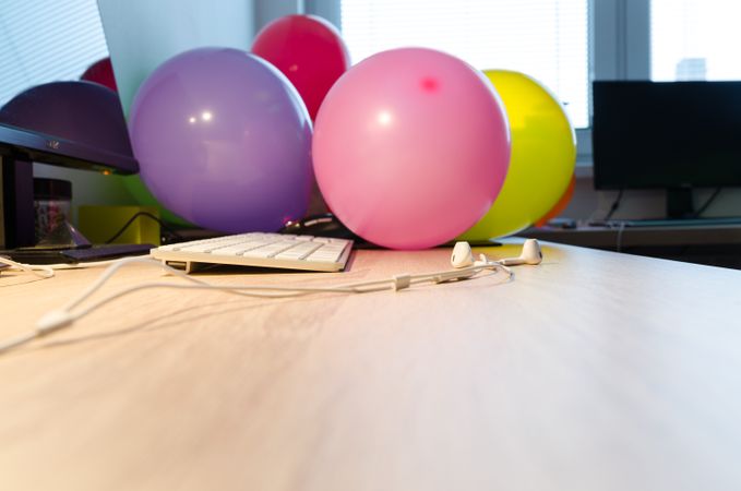 Balloons On Wooden Desk Photo