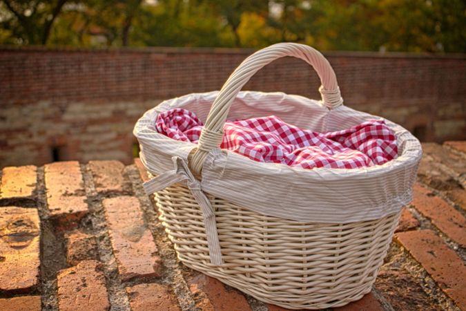 Basket On Red Brick Wall Photo