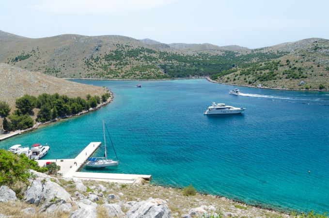Bay Beach And White Boat Photo