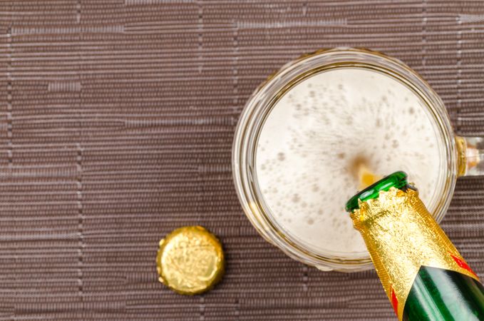 Beer Bottle With Glass And Cap Photo