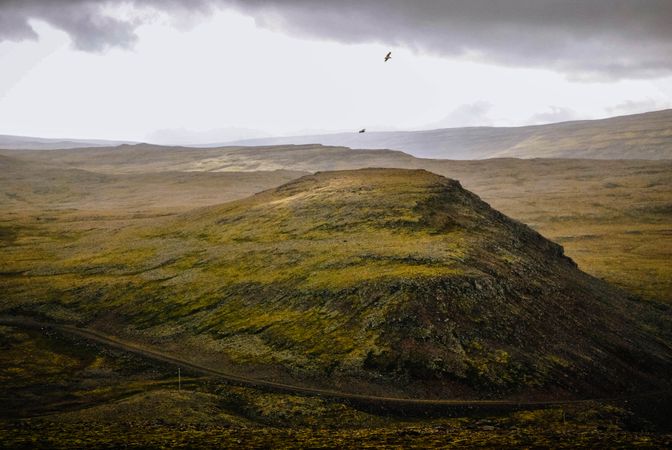 Birds Flying On Calmness Mountain At Countryside Photo