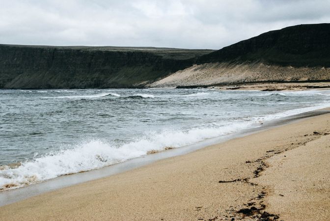 Black And Brown Sand Beach Photo