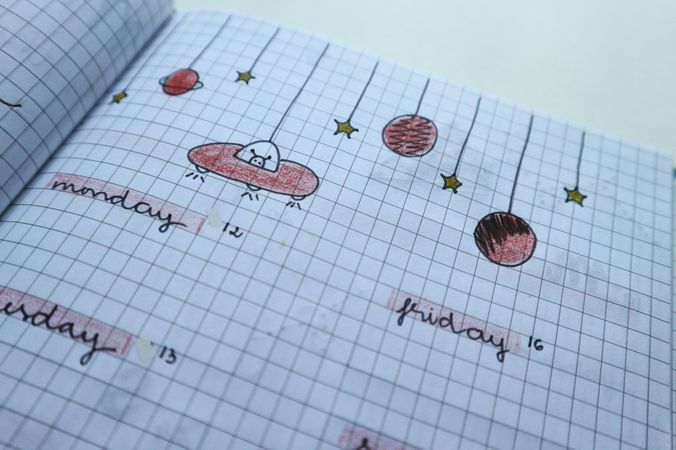 Black Graph Paper With Designer Stickers On It Photo