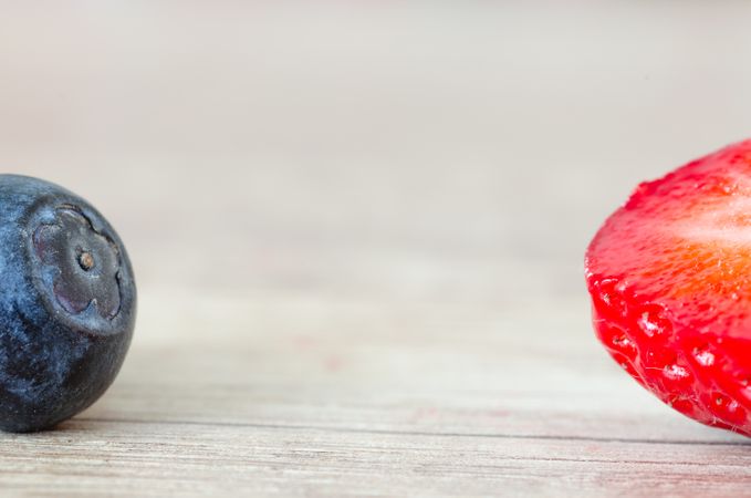 Blueberry And Strawberry Half In Frame Photo