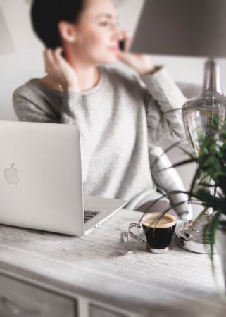 Blurry Photo Of A Working Woman Photo