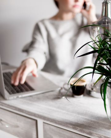 Blurry Photo Of A Working Woman Photo