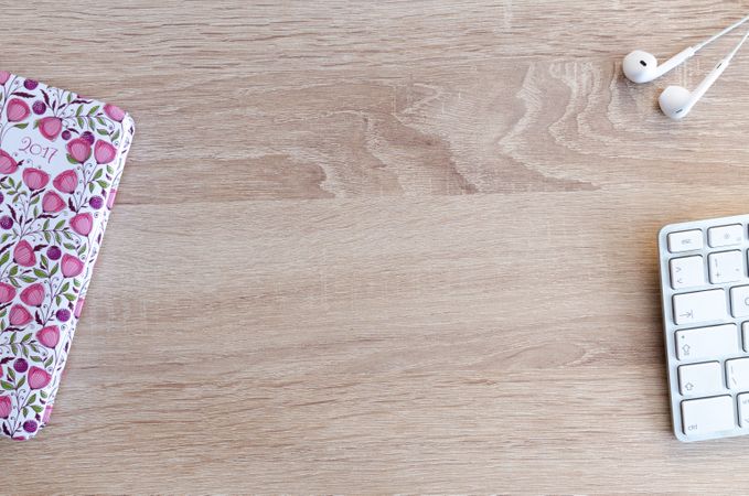 Book,Keyboard And Earphones On Wooden Table Photo