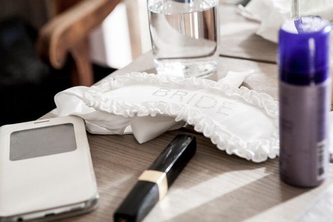Bride Makeup Kit On Wooden Table Photo