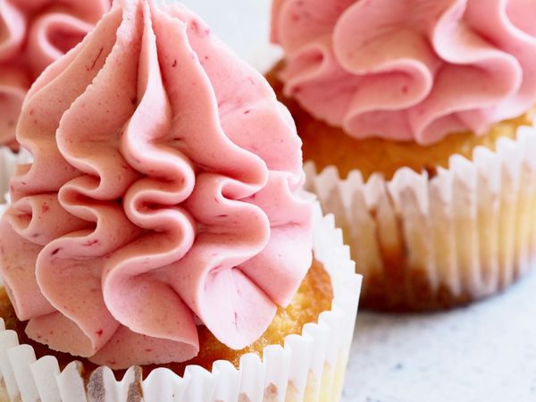 Brown Cupcake With Pink Icing Macro Photographyu Photo