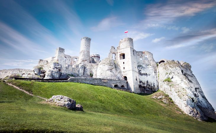 Castle On Green Field Photo