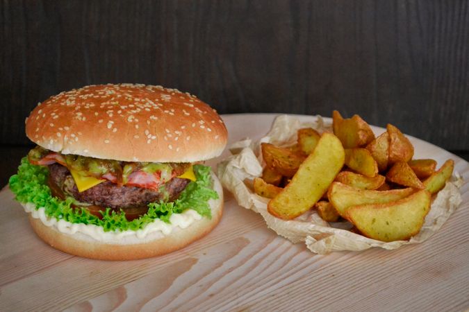 Cheeseburger With Fried Potatoes Photo