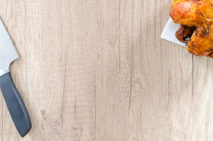 Chicken And Knife On Chopping Board Photo