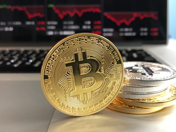 Close-up Of Gold Bitcoin Photo