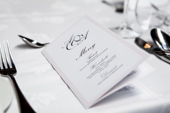 Close-up Of Menu On Dining Table Photo
