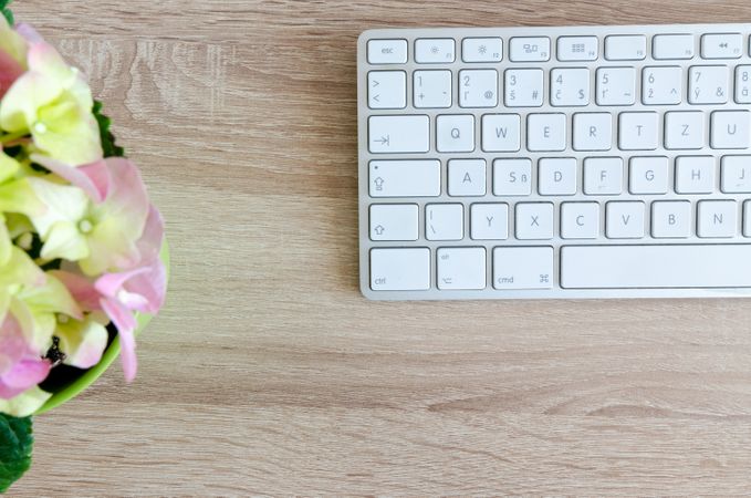 Close-up Of White Keyboard On Desk Photo