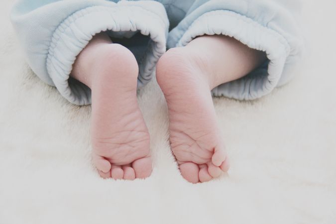 Close-up Photography Of Baby's Feet Photo