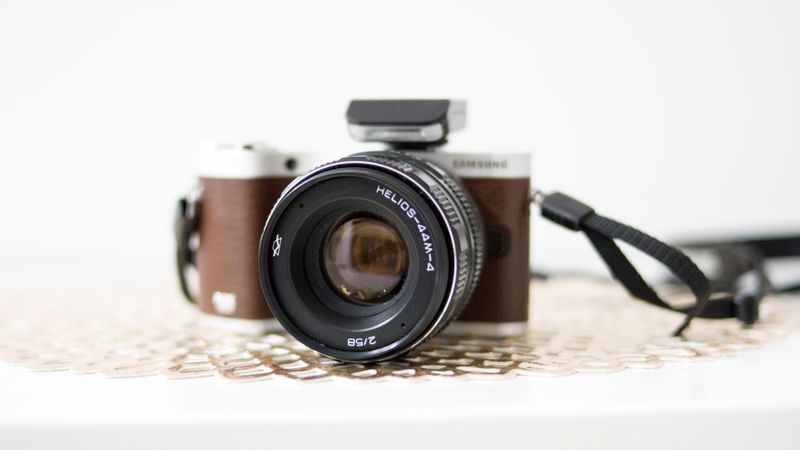 Close-up Photography Of Black And Brown Dslr Camera Photo