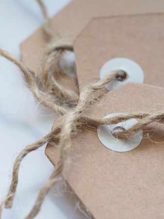 Close-up Photography Of Brown Tags Photo