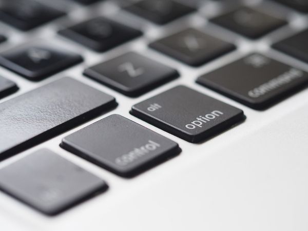 Close-Up Photography Of Macbook Keyboard Photo