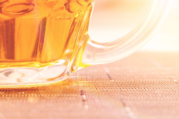 Closeup Photography Of Clear Glass Beer Mug Filled With Yellow Liquid Photo