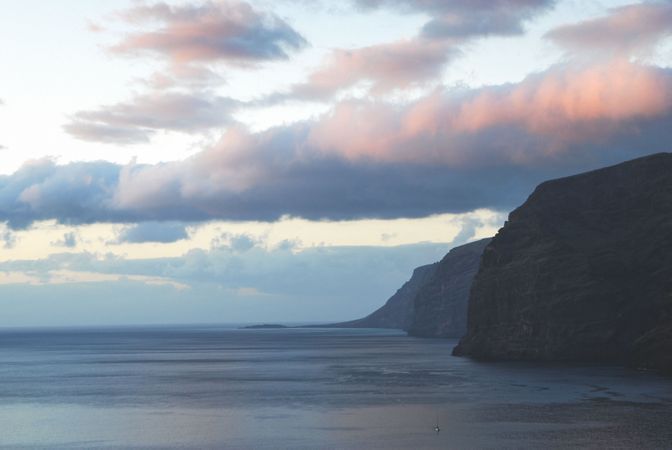 Coast Evening With Mountain Photo