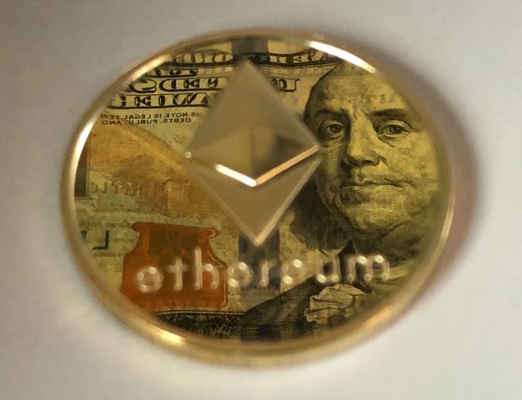 Cryptocurrency On Table Photo