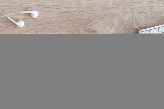 Earphones,Keyboard,Sticky Notes On Table Photo