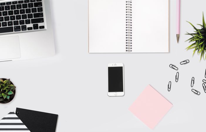 Flat-lay Photography Of Iphone, Spiral Book And Laptop Photo