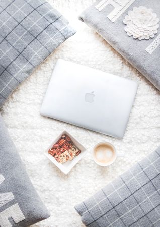 Flatlay Photography Of Macbook And Snacks Photo