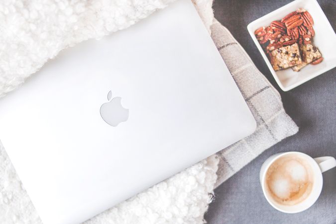 Flatlay Photography Of Macbook And Snacks Photo