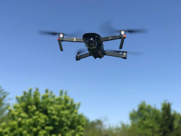Flying Black Drone Photo