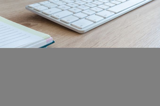 Focused Book And White Keyboard Photo