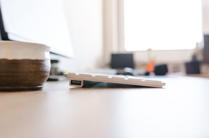 Focused Coffee Cup On Desk Photo