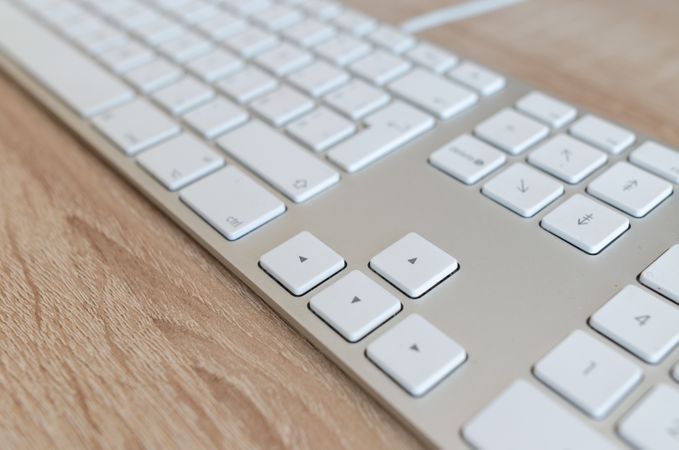 Focused White Keyboard On Desk Photo