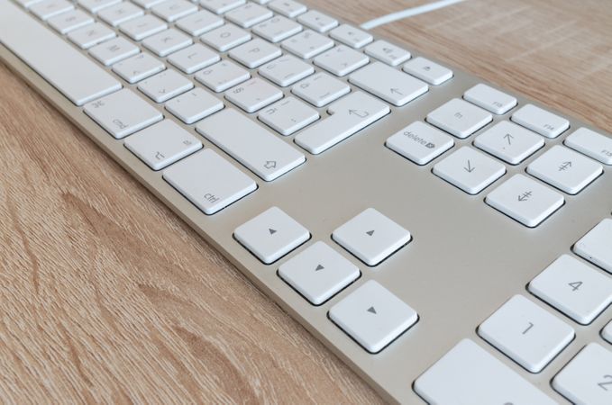 Focused White Keyboard On Desk Photo