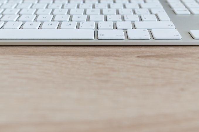 Focused White Keyboard On Table Photo