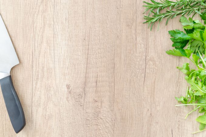 Fresh Basil Leaves On Chopping Board With Knife Photo