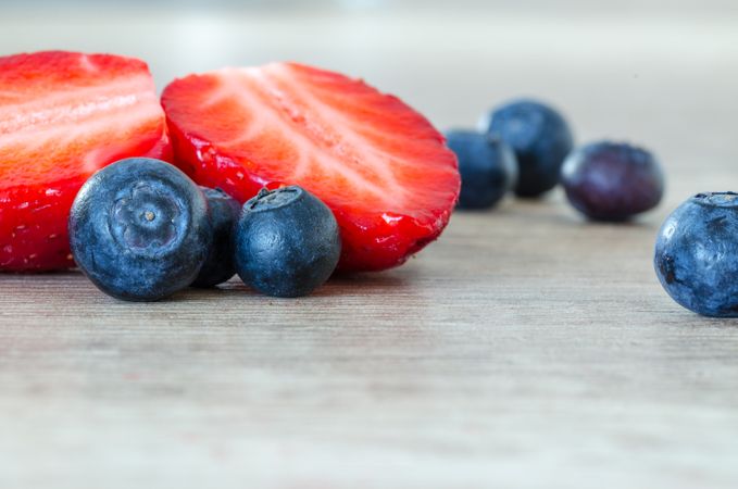 Fresh Blueberries And Strawberry On Table Photo