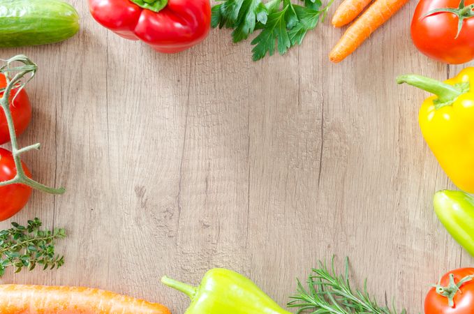 Fresh Carrots, Tomatoes Bell Pepper On Wooden Table Photo
