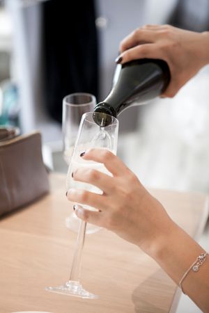 Girl Celebrating Wedding With Champagne Photo