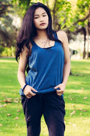 Girl Giving Pose In Garden Photo