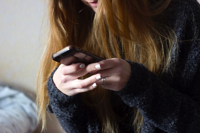 Girl Using Smartphone Photo