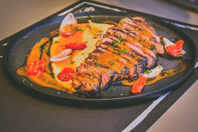 Gourmet In Black Plate Photo