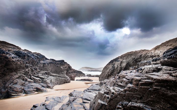 Gray Rock Formation Under Clouds At Daytime Photo