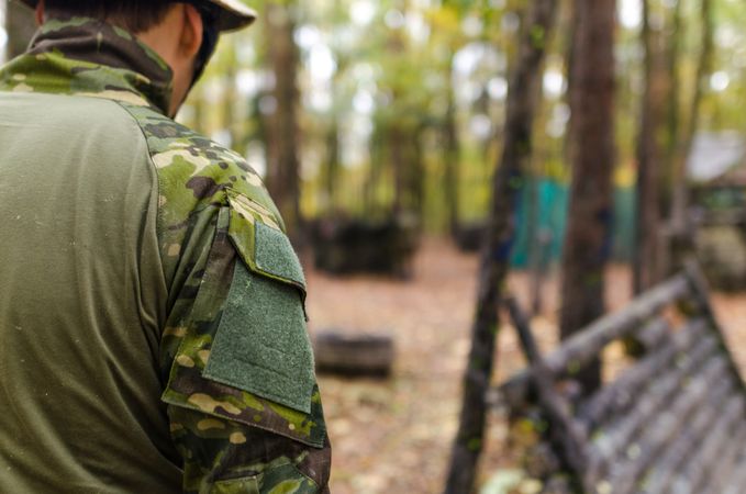 Green And Brown Camo Uniform Wearing By Man Photo