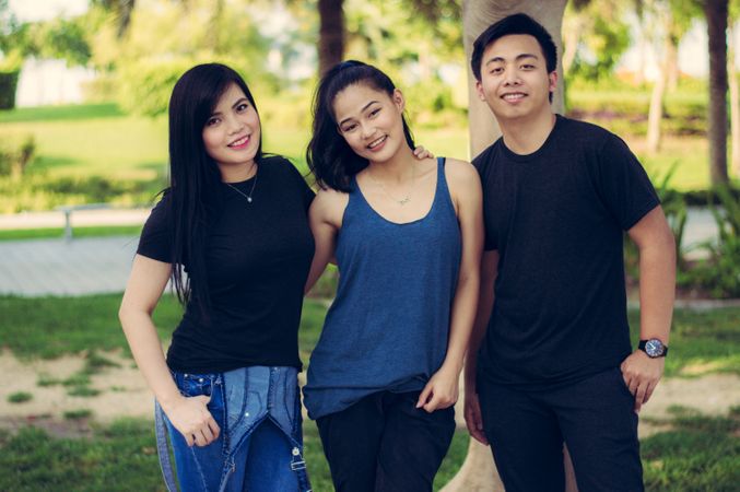 Group Of Three Friend Taking Picture In Garden Photo