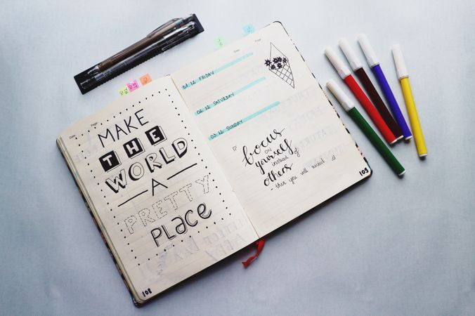 Inspirational Quotes Written On A Planner Photo